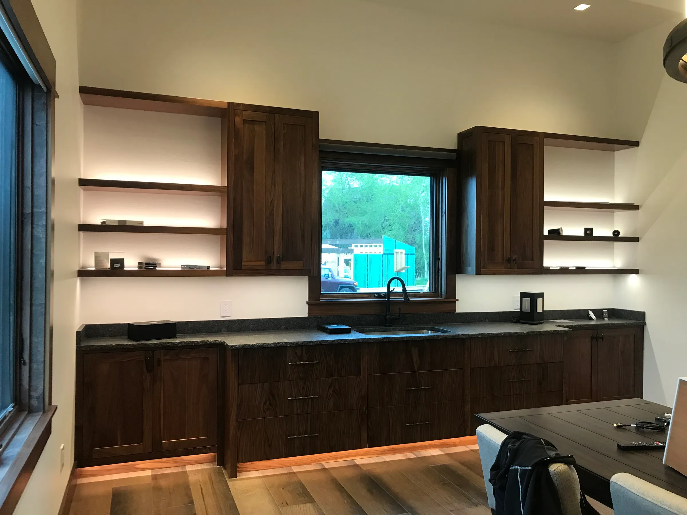 Custom kitchen with dark walnut cabinetry